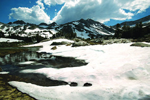 alpine lake and snowfield