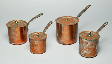 Copper pots with fitted lids